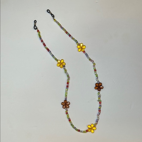 Glasses / sunglasses holder with Yellow and Brown flowers and colorful beads - Picture 1 of 6